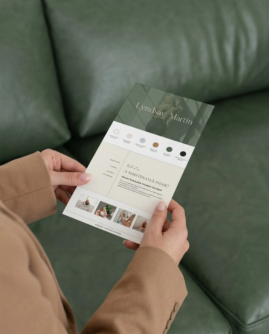 Printed Canva brand kit for Lyndsay Martin held in hands